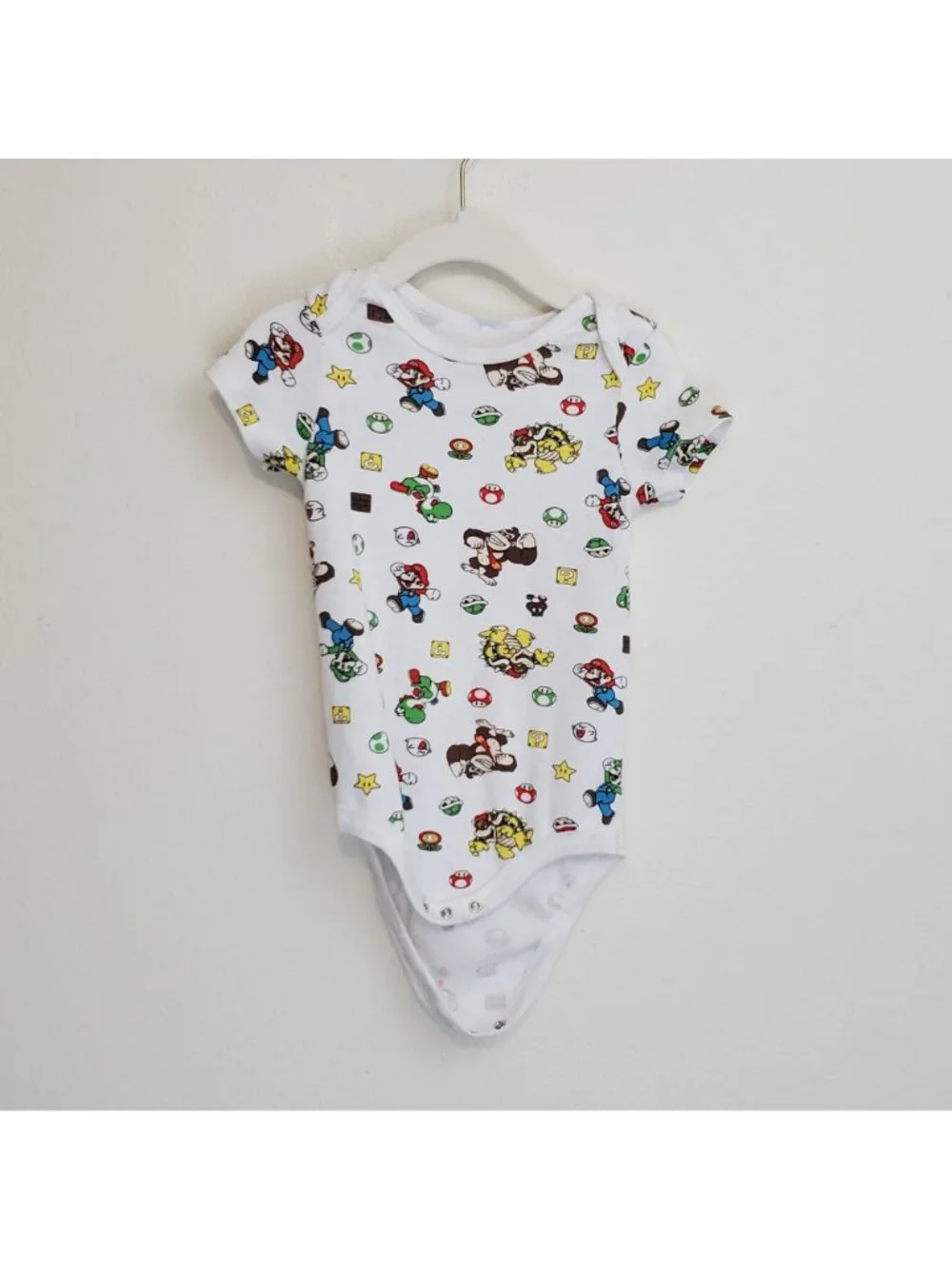 Super Mario Nintendo all-over-print baby onesie